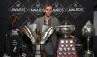 Edmonton Oilers center Connor McDavid poses with NHL awards